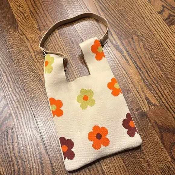 The Lucca Make It Mini Clutch is a knitted bag with a unique unstructured design - Picture 3 of 3